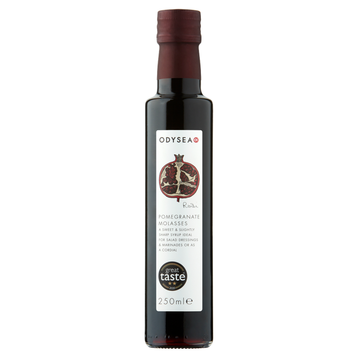 Bottle of Odyssea pomegranate molasses on a white background