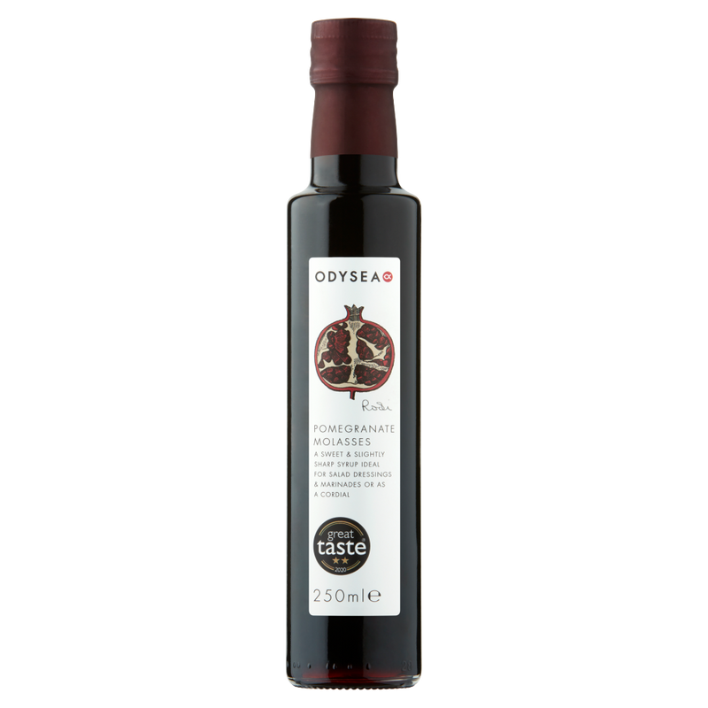 Bottle of Odyssea pomegranate molasses on a white background