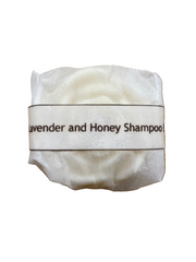 Goats milk shampoo soap bar - lavender and honey wrapped in parchment paper